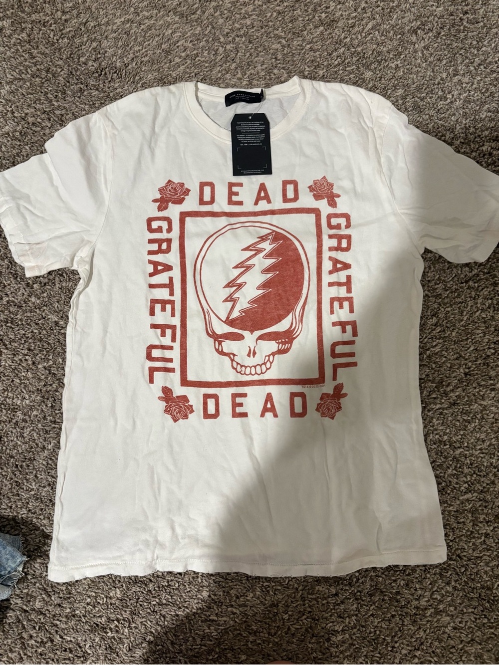 Junk Food Clothing White Tee with Red Grateful Dead Skull Graphic